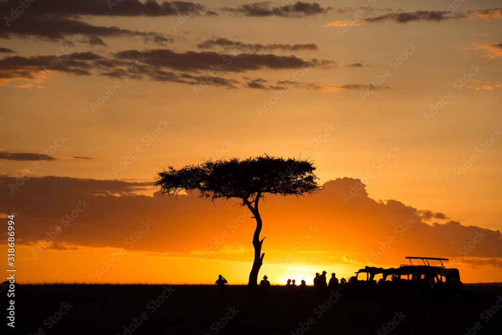Tourists enjoying evening tea during Sunset at Masai Mara