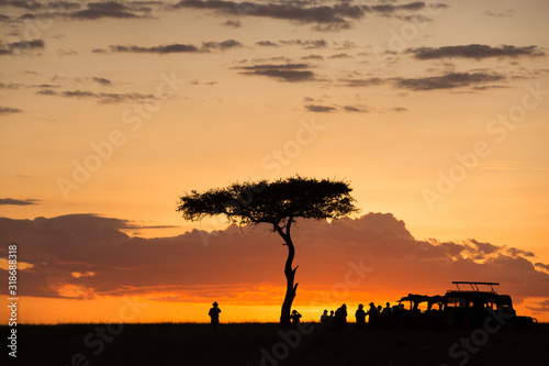 Tourists enjoying during Sunset at Masai Mara