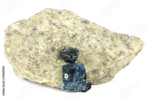 afghanite on calcite matrix from Badakhshan, Afghanistan isolated on white background photo