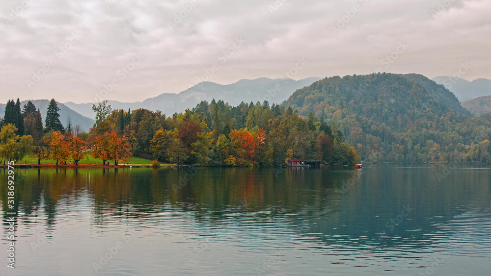 Colorful autumn landscape with promenade around Lake Bled in Slovenia