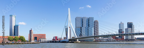 Fotobehang Erasmus Bridge And Skyline Of kop Van Zuid District In Rotterdam,  Netherlands op maat kopen? - Kies Foto4art.nl