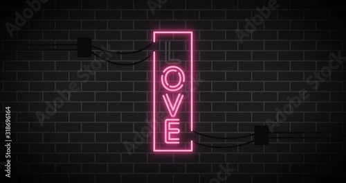 Neon sign.Valentine sign on brick background.