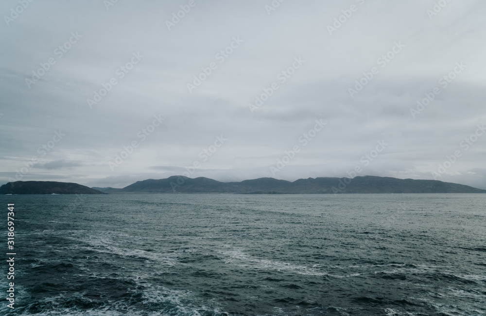 Atlantic ocean landscape with mountains in the background