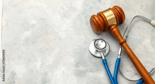 Obraz Judge gavel and stethoscope. The law in medicine, the sentence on medical negligence