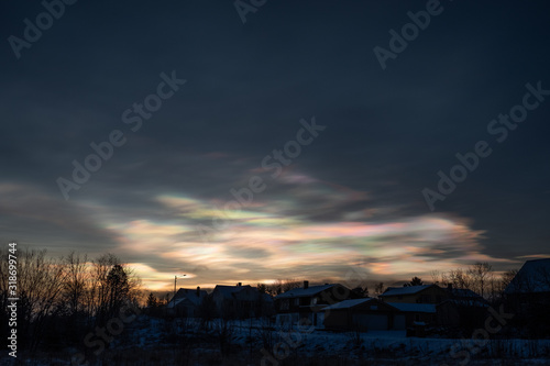 Polar stratospheric cloud or mother of pearl or nacreous clouds as they called this phenomenon. This one is from Lofoten islands