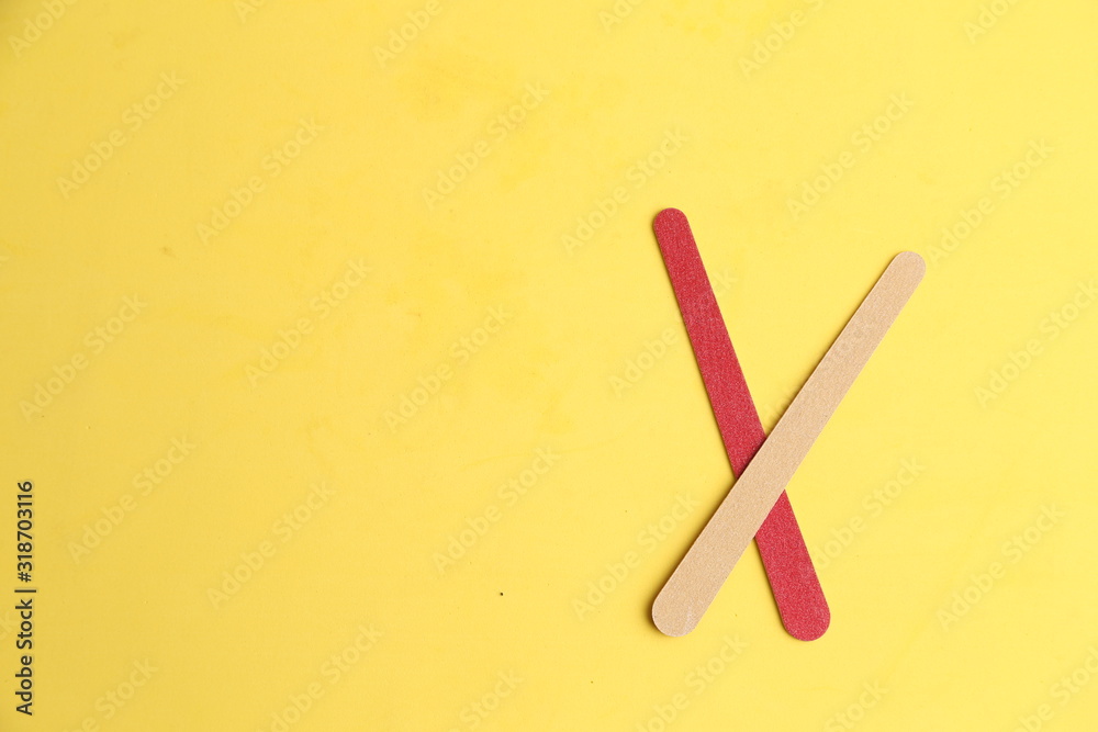 Nail file on colorful background Nail file on colorful background