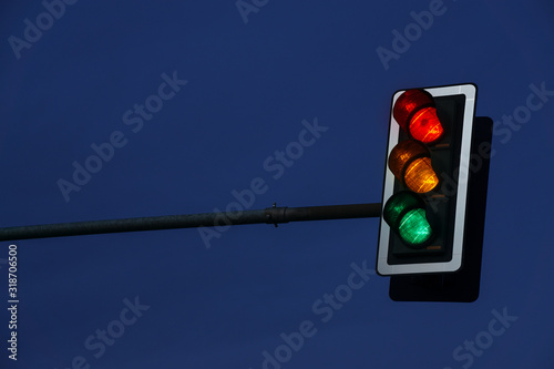 traffic light the three colors light up red, yellow and green at the same time.