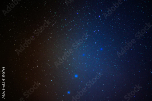 The constellation Ursa Major against the background of the other twinkling stars, the shape of a bucket. Astrological night starry sky.