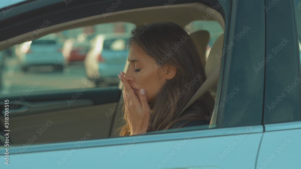 Face young woman sitting in car sneeze holds a handkerchief feeling sick vehicle influenza health illness flu medical sickness problem business infection headache slow motion