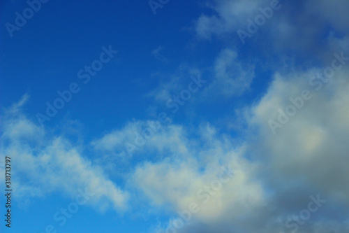 Blurred image of blue sky and clouds. Beautiful landscape background  copy space for text.