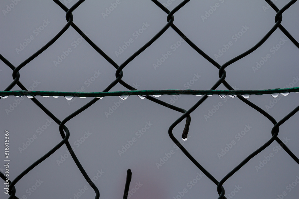 chain link fence with barbed wire