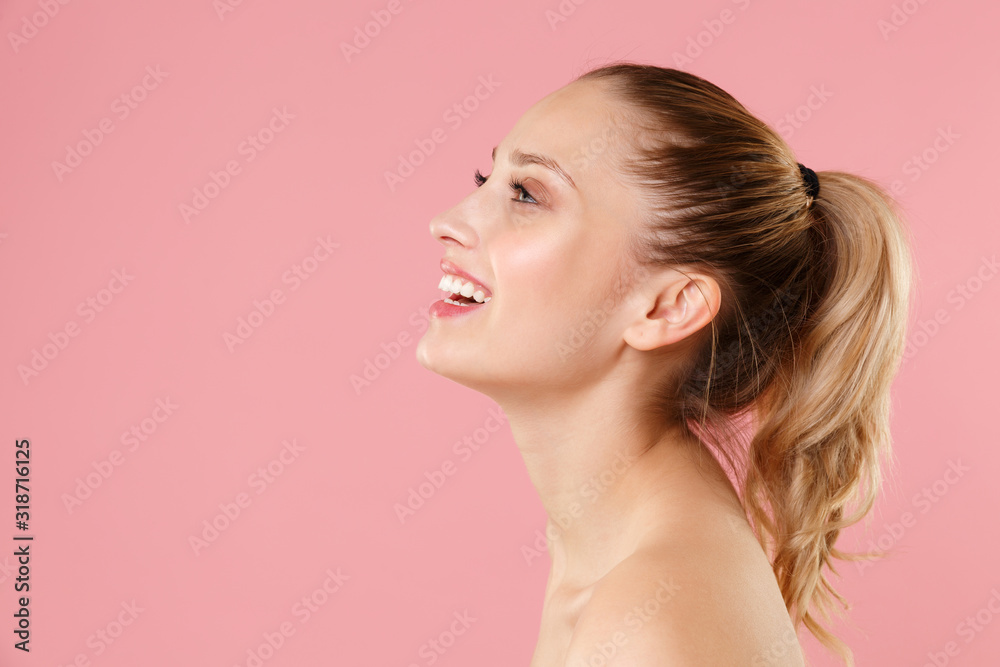 Close up blonde half naked woman 20s perfect skin nude make up blue eyes isolated on pastel pink wall background studio portrait. Skin care healthcare cosmetic procedures concept. Mock up copy space. Close up blonde half naked woman 20s perfect skin nude make up blue eyes isolated on pastel pink wall background studio portrait. Skin care healthcare cosmetic procedures concept. Mock up copy space.