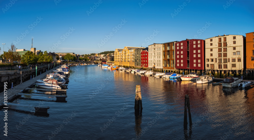 TRONDHEIM, NORWAY - july, 2019: Colorful old houses at the Nidelva river embankment in Trondheim, Norway.