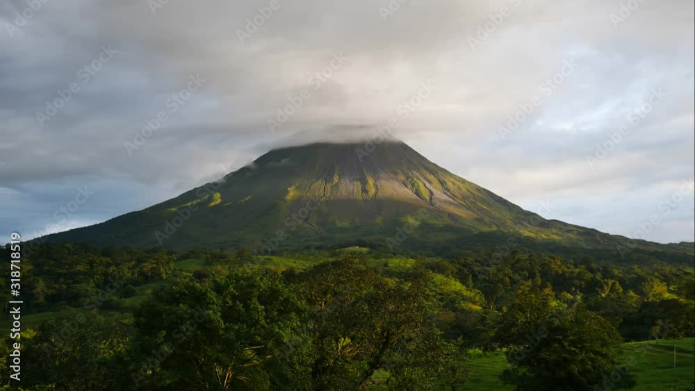 Timelapse volcano arenal at sunset with nice clouds in Costa Rica Timelapse volcano arenal at sunset with nice clouds in Costa Rica