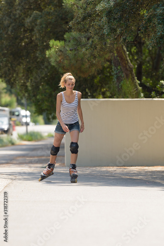 joyful woman wearing roller skates