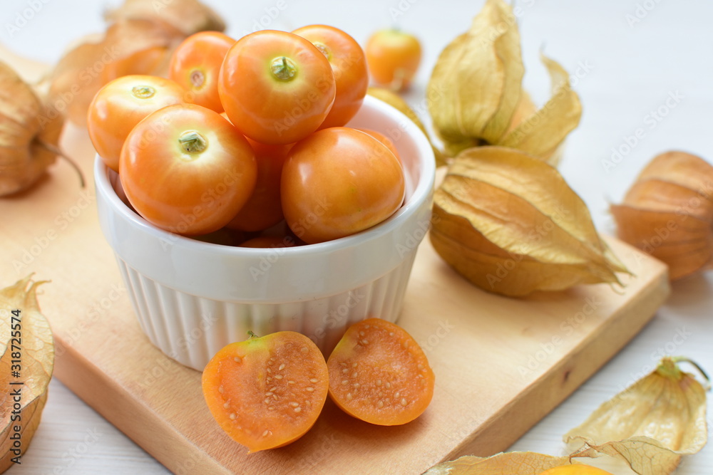 natural cape gooseberry on wooden background
