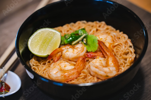 Spicy instant thai style noodles soup with shrimp (tom yum kung) 
