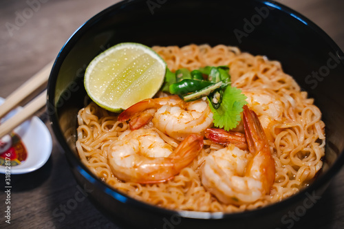 Spicy instant thai style noodles soup with shrimp (tom yum kung) 