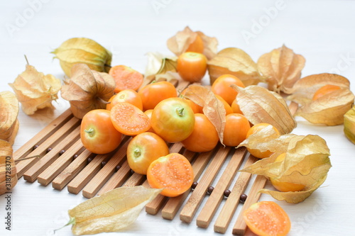 natural cape gooseberry on wooden background