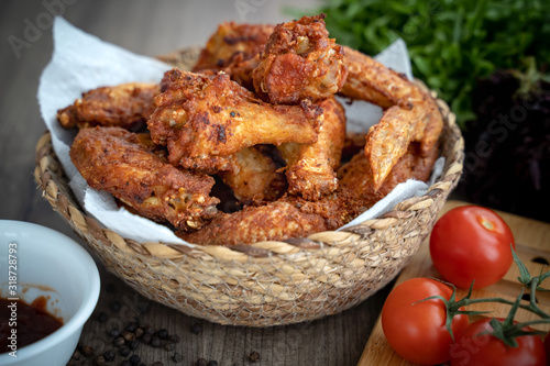 crispy fried chicken in the basket with salad