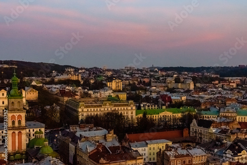 View on historic center of the Lviv at sunset. View on Lvov cityscape from the town hall