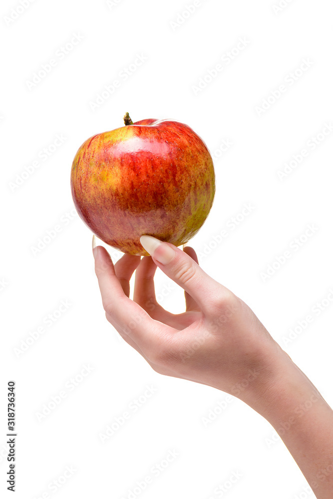 Hand of young woman with natural nails holds natural apple. More natural nails, concept healthy lifestyle. Caring for the health of hands and nails. Woman Hands Natural Nails, closeup.