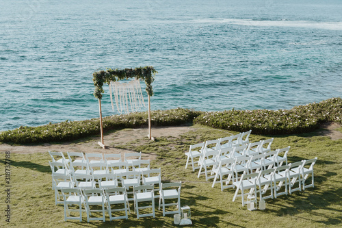 intimate elopement on the beach over the ocean photo