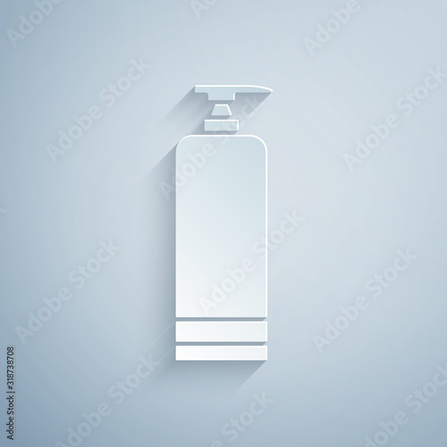Paper cut Cream or lotion cosmetic tube icon isolated on grey background. Body care products for men. Paper art style. Vector Illustration