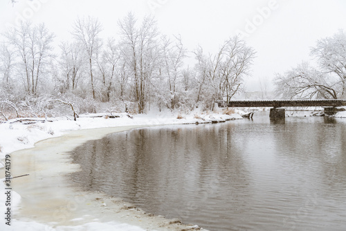 Snowy Wisconsin Landscape along River with Canadian Geese