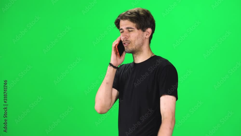 Brunette guy goes and talks on the phone, Chroma Key