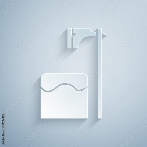 Paper cut Executioner axe in tree block icon isolated on grey background. Hangman, torturer, executor, tormentor, butcher, headsman. Paper art style. Vector Illustration