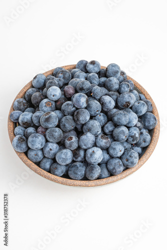 Fresh Blueberries In Glazed Bowl