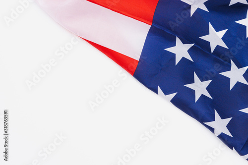 US American flag on white background. For USA Memorial day,  Memorial day, Presidents day, Veterans day, Labor day, Independence day, or 4th of July celebration. Top view, copy space for text.