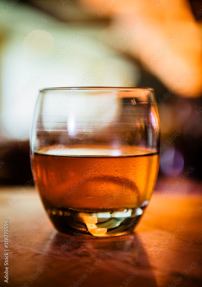 Whiskey cocktail with orange garnish Whiskey cocktail with orange garnish