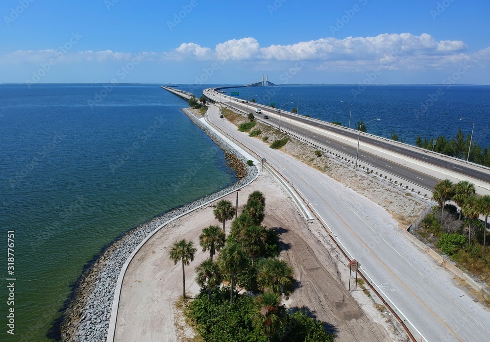 The aerial view of the south entrance to the fishing pier near Bob Graham Sunshine Skyway Bridge, St Petersburg, Florida, U.S.A The aerial view of the south entrance to the fishing pier near Bob Graham Sunshine Skyway Bridge, St Petersburg, Florida, U.S.A
