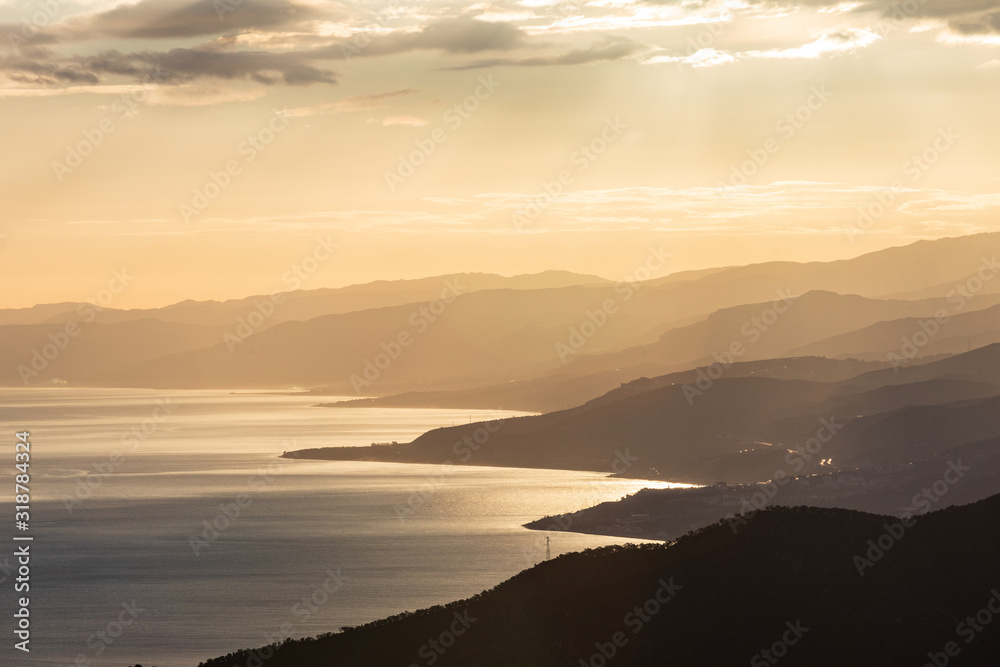 Italy, Sicily, Palermo, Pollina. Late afternoon view of the Sicilian coast from Pollina.