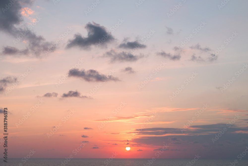 Fototapeta premium Beautiful pink color clouds on the sunset sky.