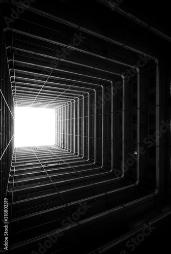 Fototapeta Naklejka Na Ścianę i Meble -  abstract background with light shining through the darkness