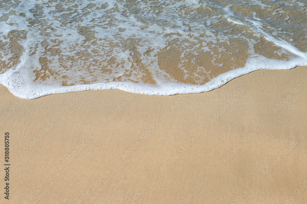 White waving on clean find sand beach, summer outdoor day light, nature concept background White waving on clean find sand beach, summer outdoor day light, nature concept background