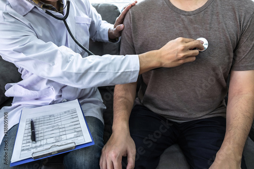 Doctor using a stethoscope checking patient about the problem of illness, sickness condition and recommend with examining treatment method