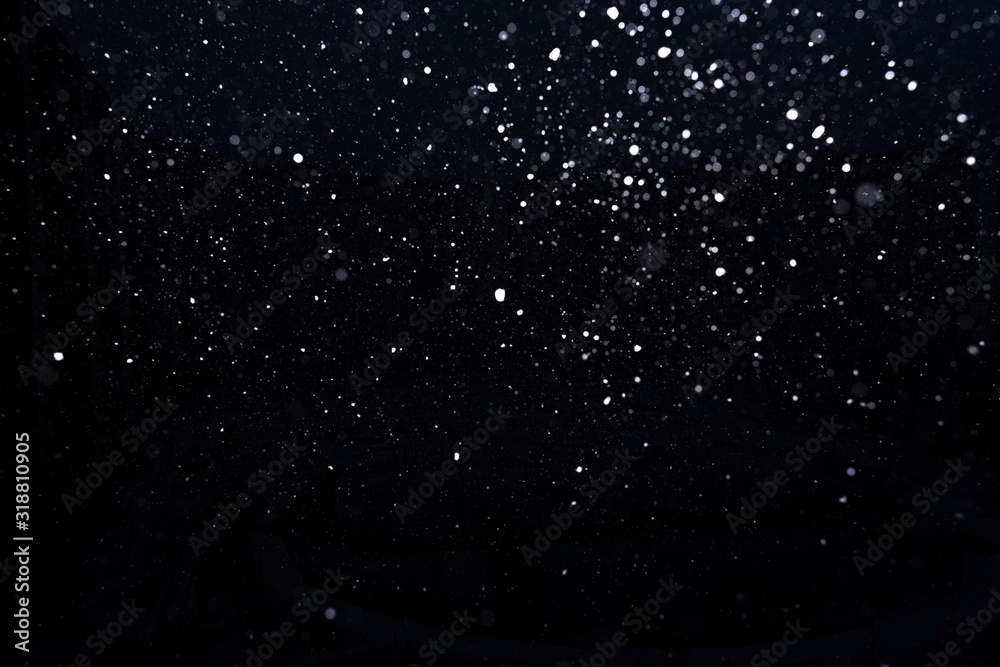 Fototapeta premium snow on a black background. snow texture