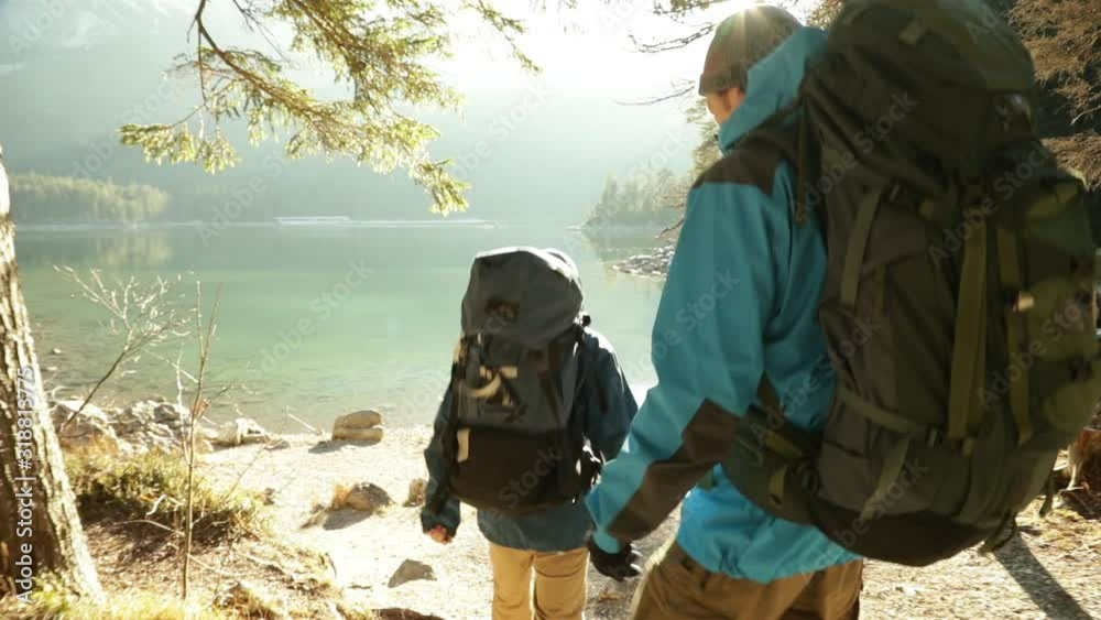 Slow motion shot of two friends hiking in Bavaria, Germany