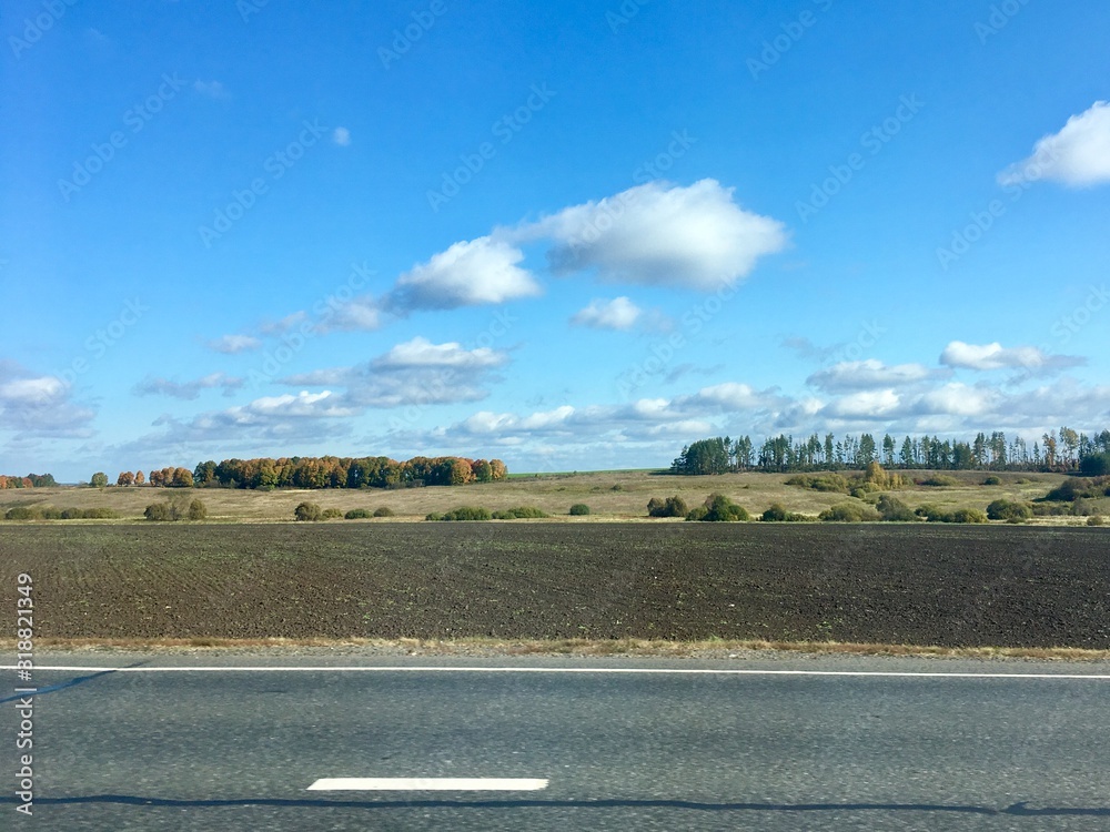 landscape with road and clouds landscape with road and clouds