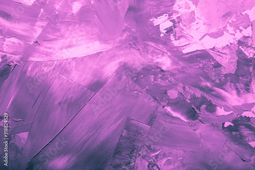 Textured plastered background with a variety of arbitrary stains. Purple. Toned