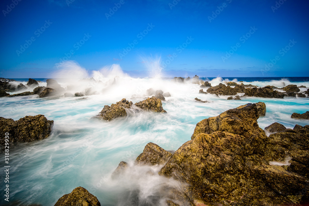 Porto Moniz - Long exposure of rocks and waves at vulcanic coast - beautiful landscape scenery of Madeira Island, Portugal