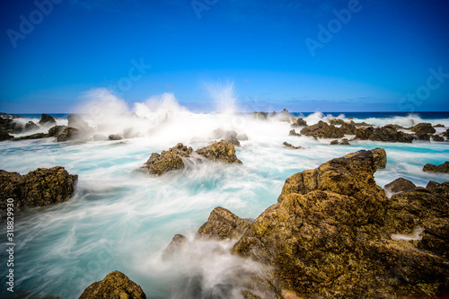 Porto Moniz - Long exposure of rocks and waves at vulcanic coast - beautiful landscape scenery of Madeira Island, Portugal