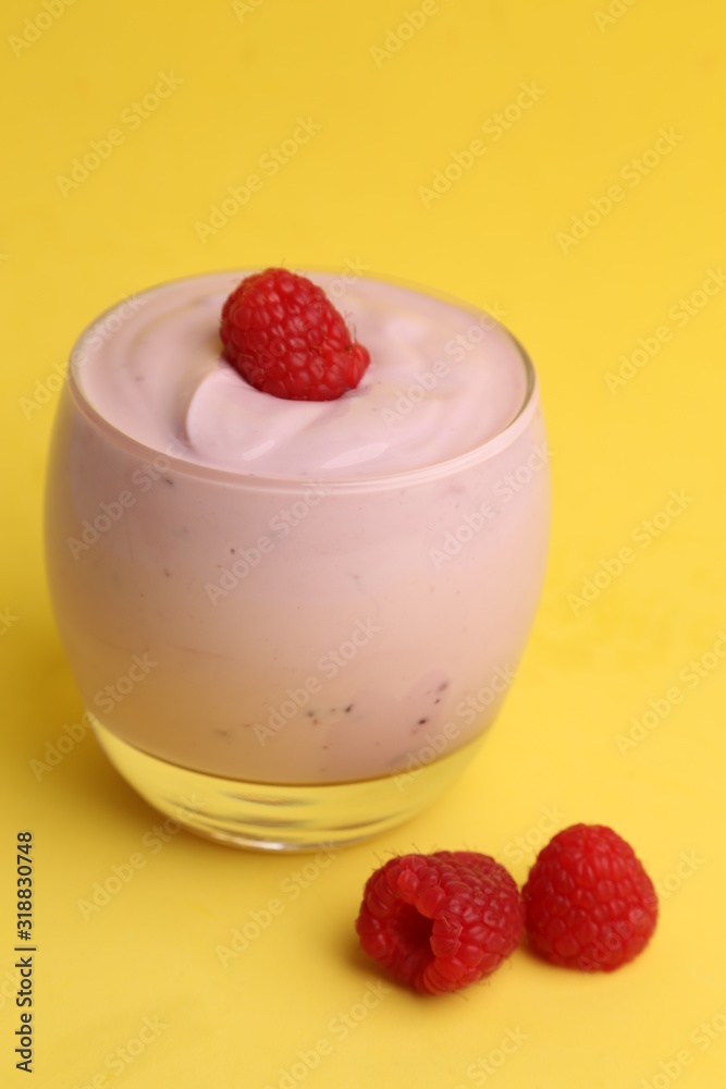 delicious raspberry yogurt in color background delicious raspberry yogurt in color background