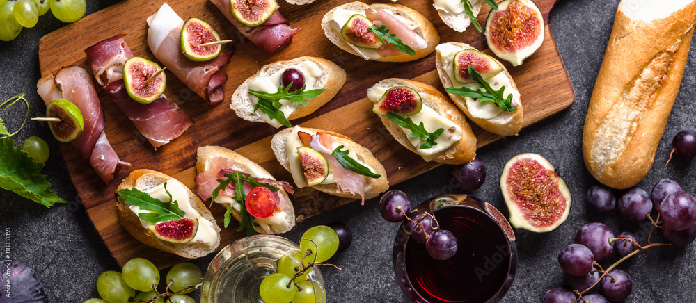 Mediterranean snack for wine. Traditional tapas bar, spanish table with  food, platter with appetizer or italian bruschetta. Stock Photo | Adobe  Stock