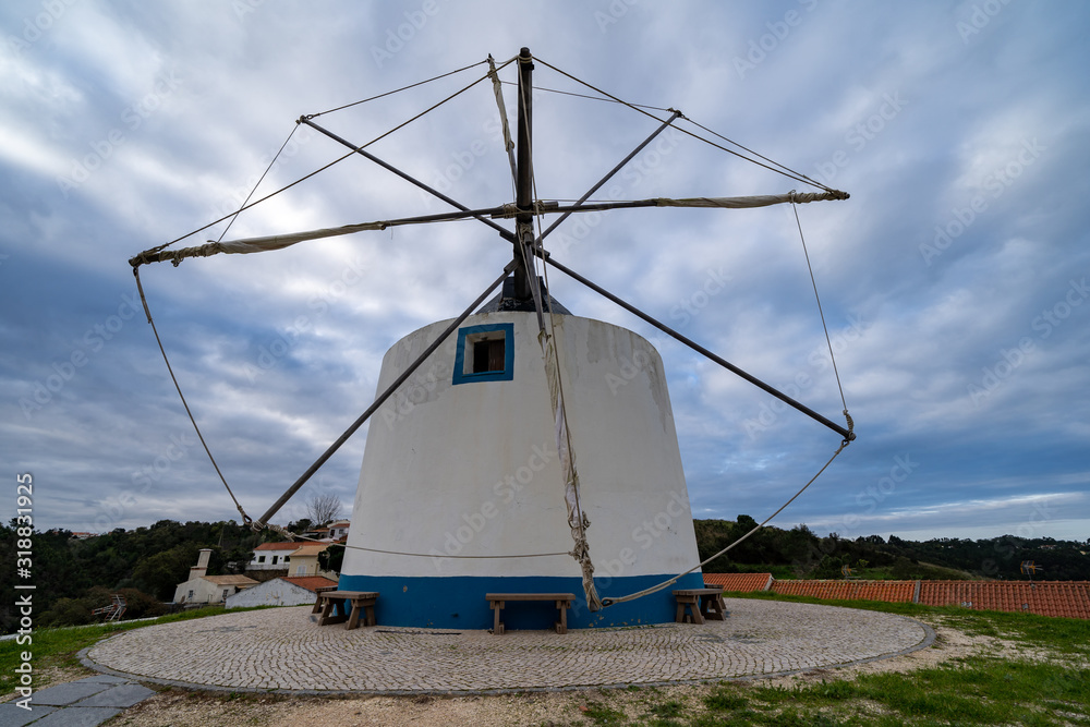 A traditional Portuguese windmill near the Algarve town of Odeceixe, Portugal