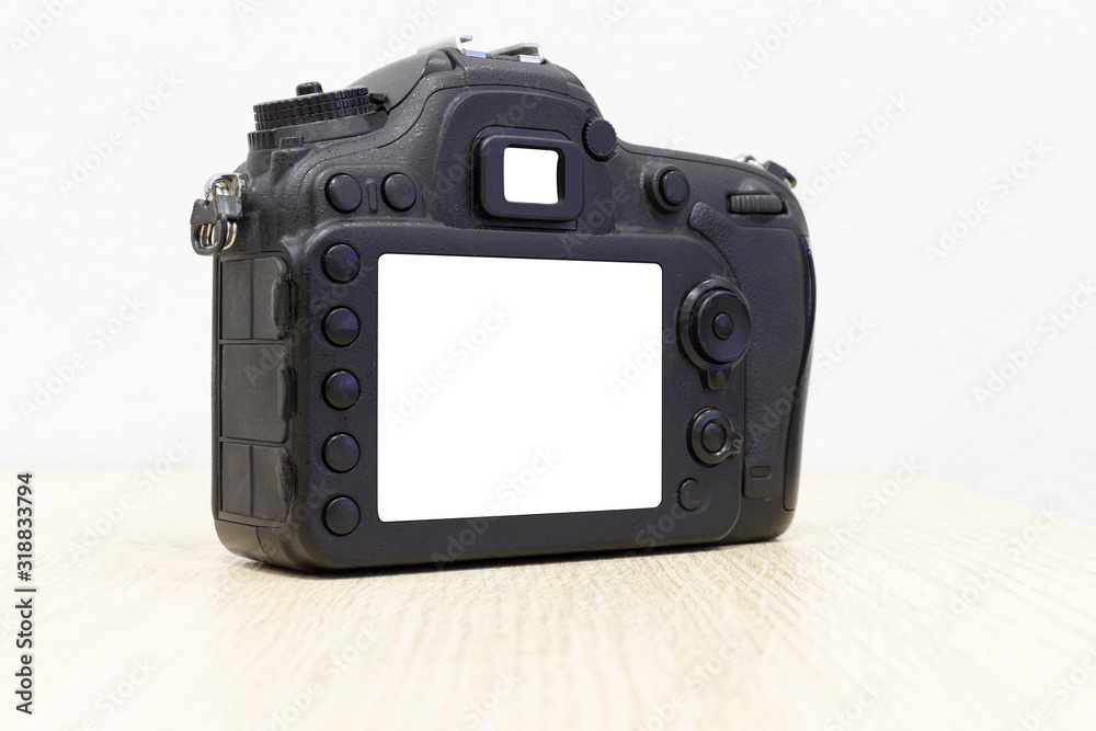 Camera rear camera on tabel wood white background. Camera rear camera on tabel wood white background.